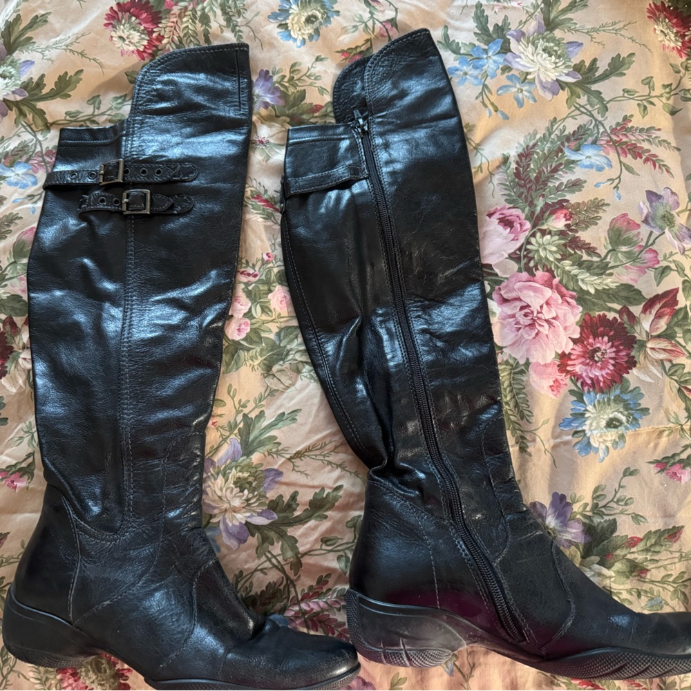 Black leather knee high boots